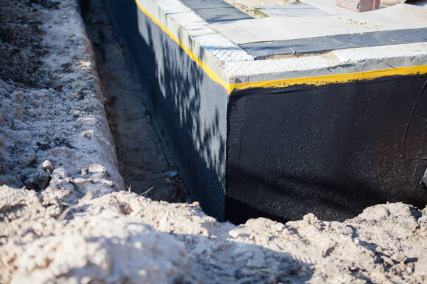 Professional Emergency Waterproofing technician working in Annandale, MN